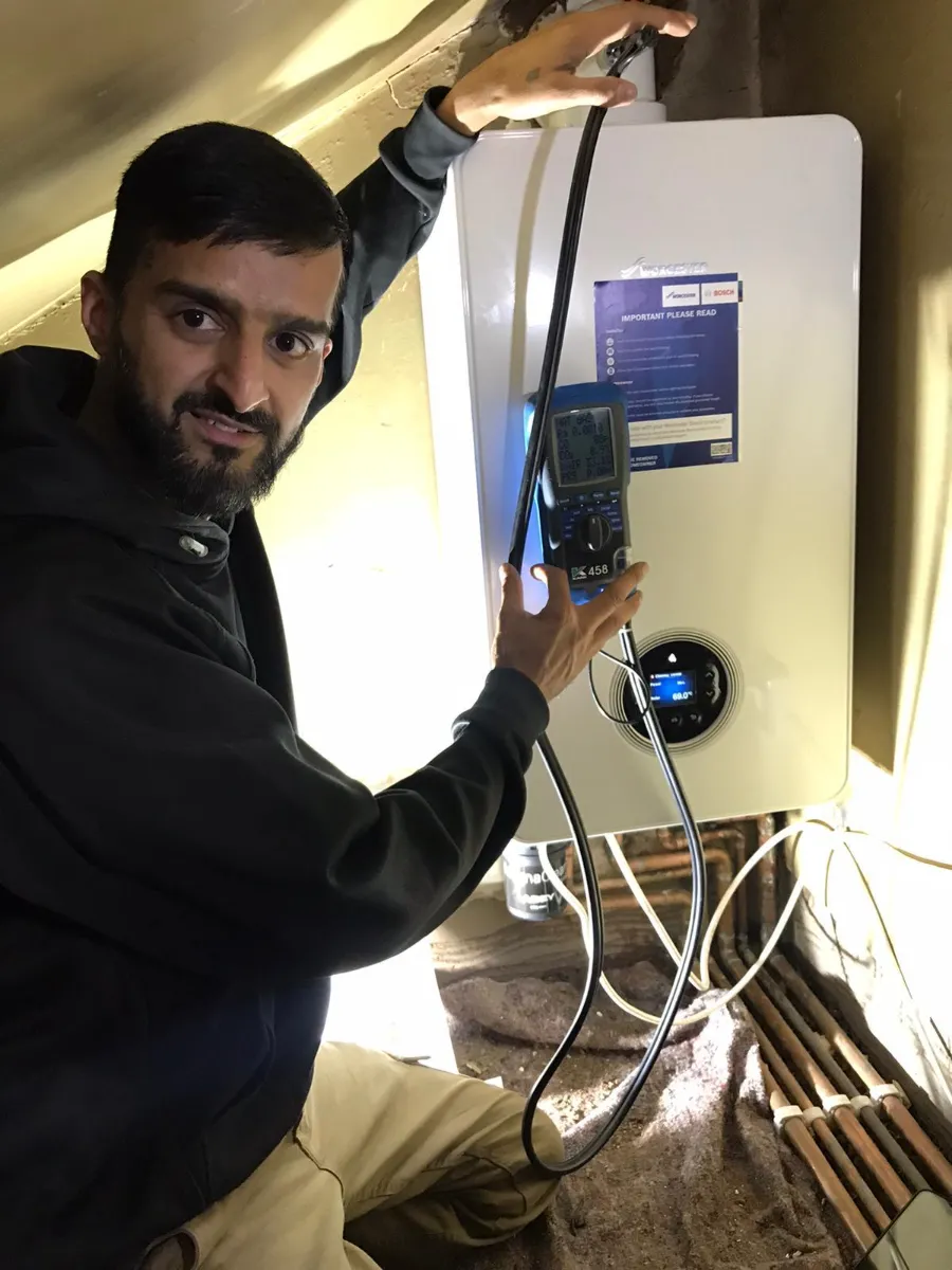 Professional plumber at work